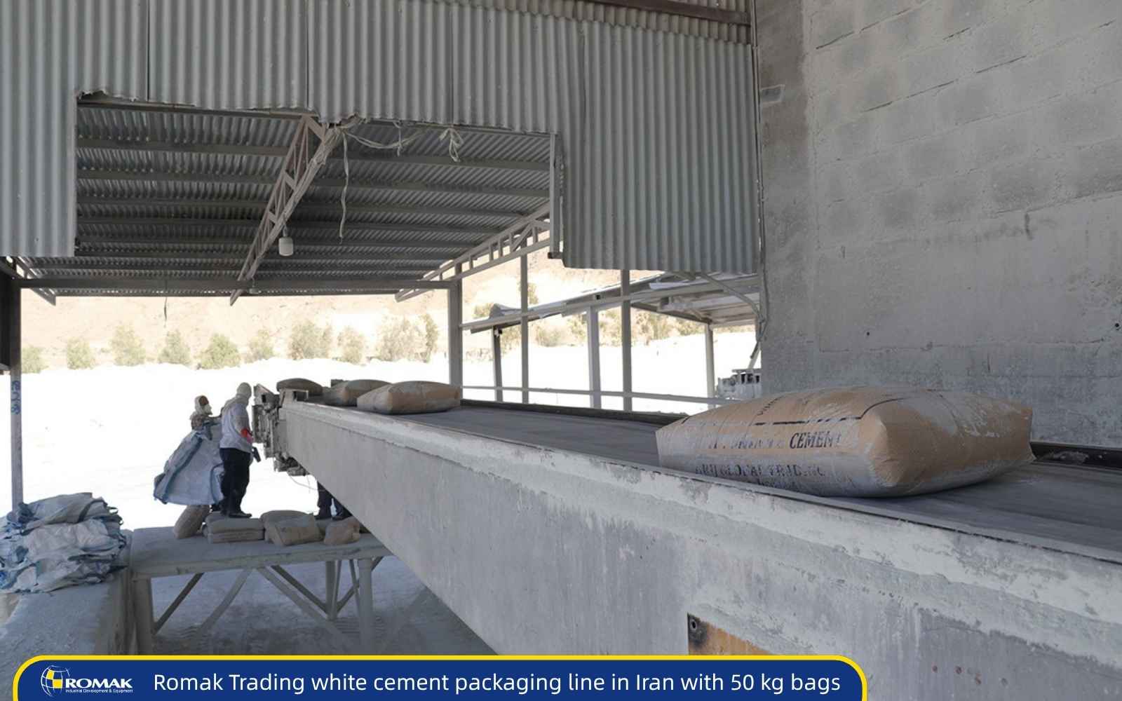 Iran white cement packaging line with 50 kg bags at production site Workers loading 50 kg white cement bags onto a conveyor belt at a cement packaging facility in Iran